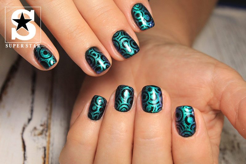 Strange with dark green nails