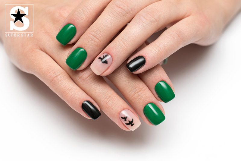 Strange with dark green nails